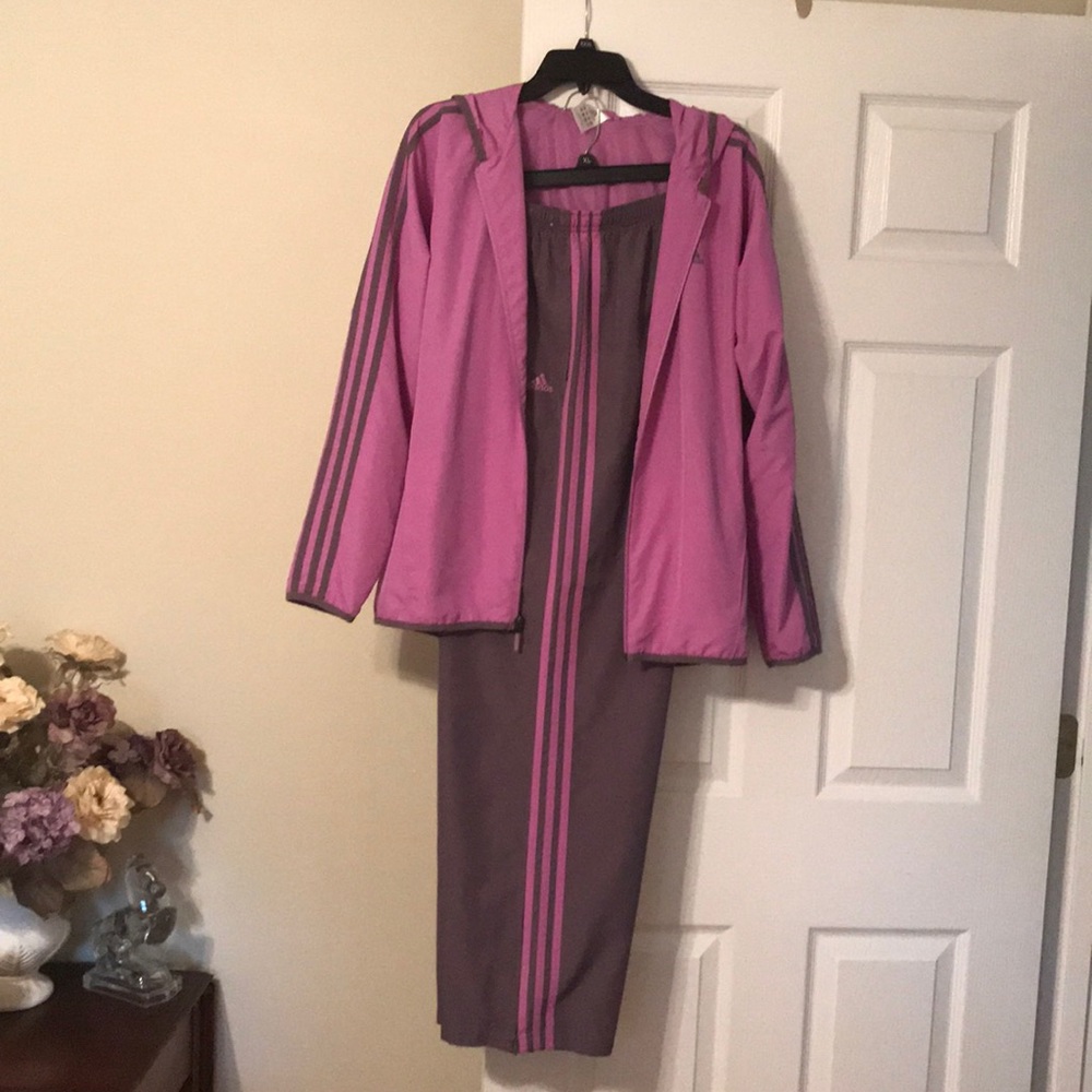 Two tone purple athletic suit.